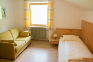 Einzelzimmer mit Couch